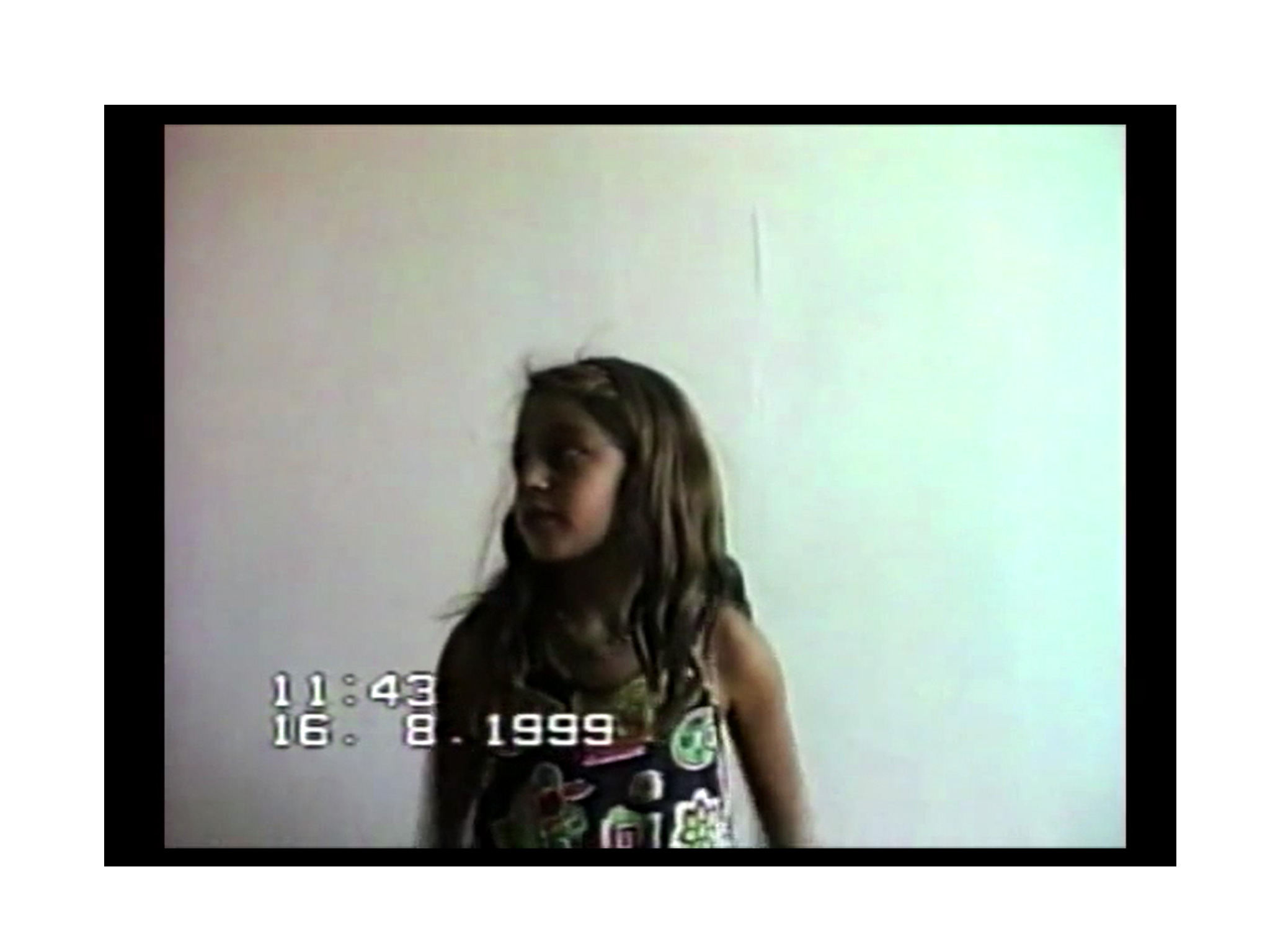 Screencap from video, showing a young girl