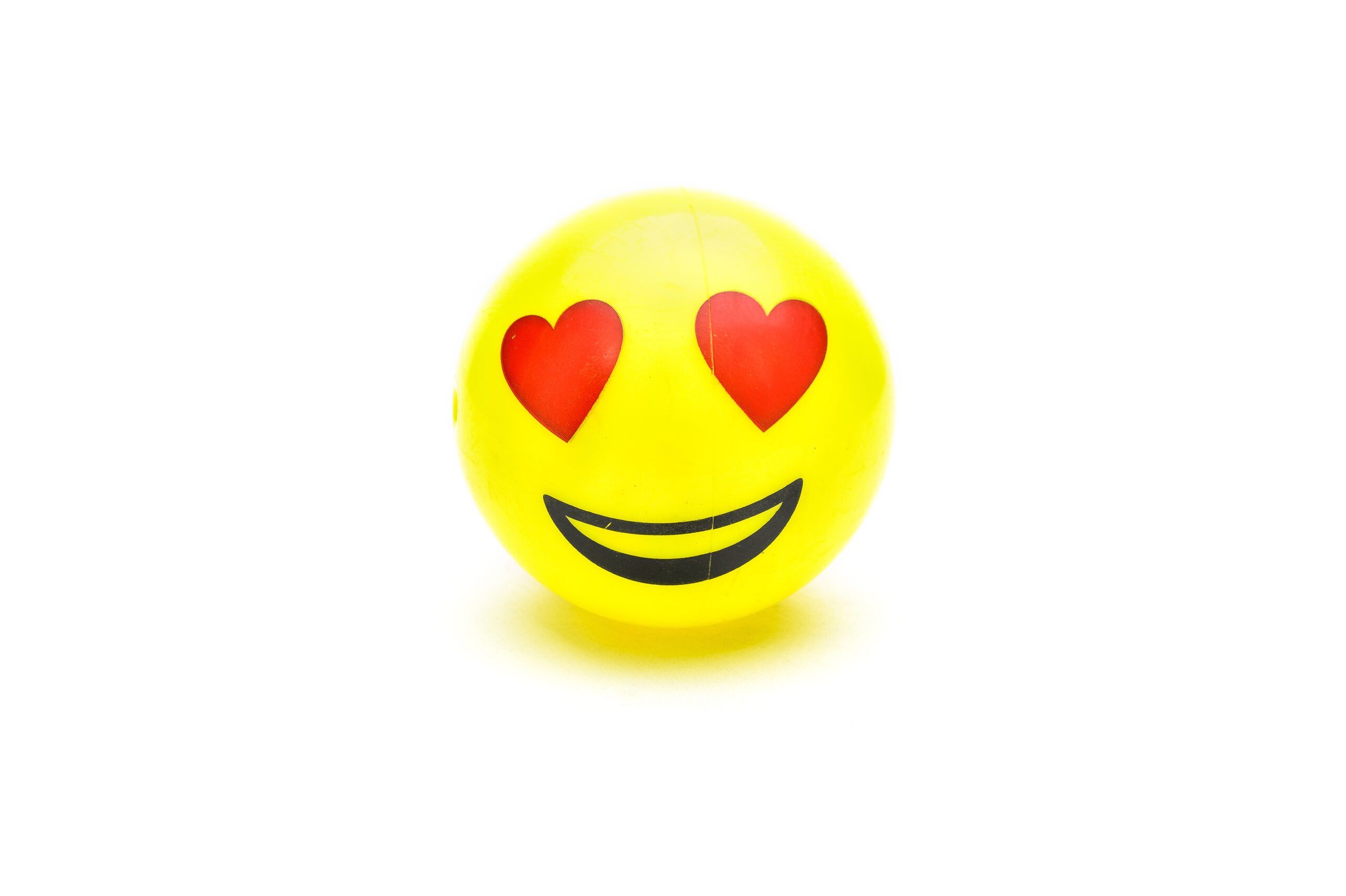 Plastic ball in the shape of heart-eyes emoji