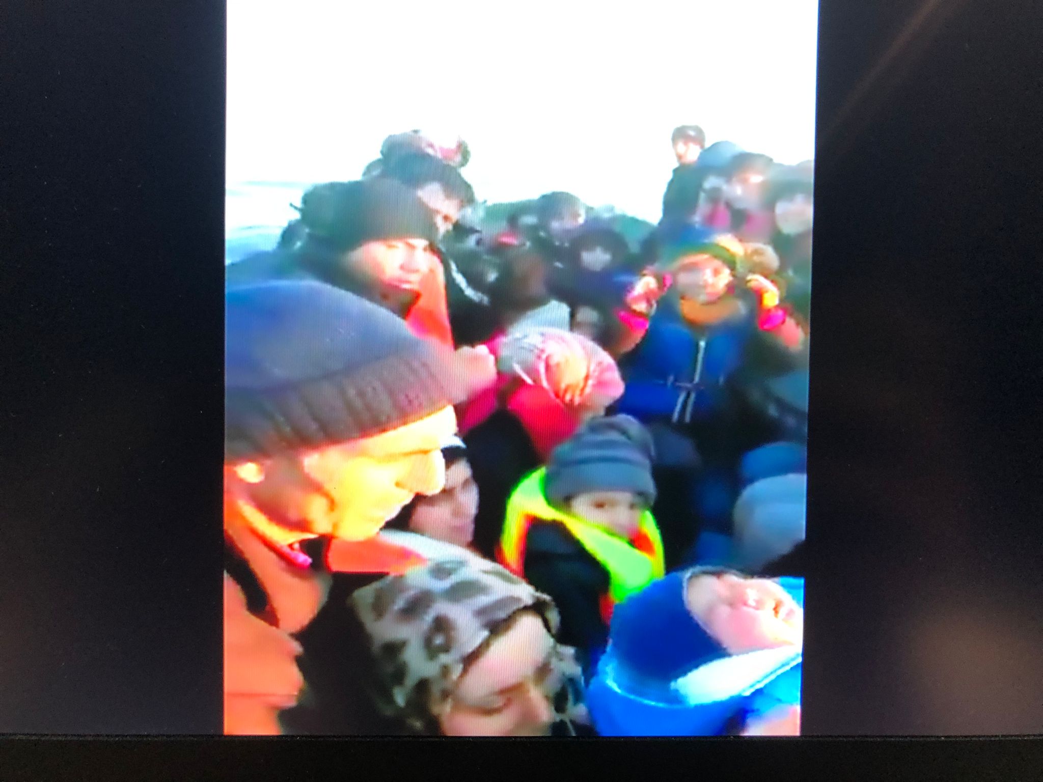 Screen cap of the video showing people on the move in boat
